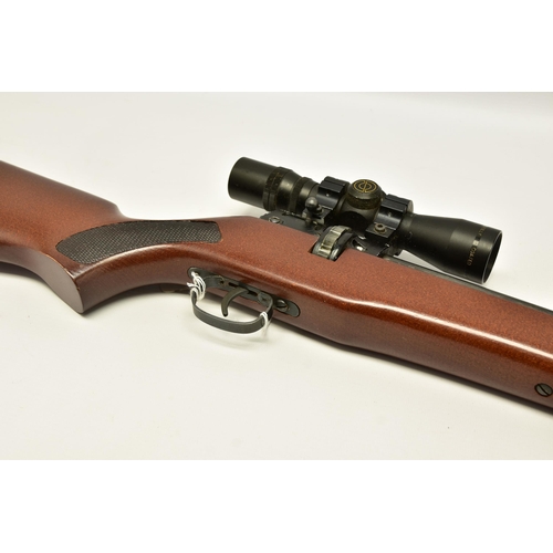 351 - A  .22 '' ROTARY MAGAZINE PUMP UP AIR RIFLE  fitted with a beech stock, in working order and excelle... 