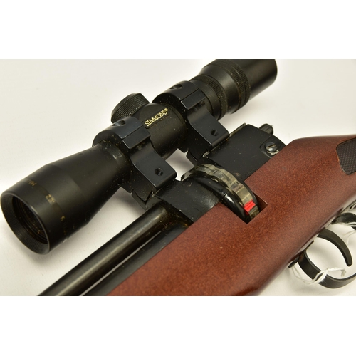 351 - A  .22 '' ROTARY MAGAZINE PUMP UP AIR RIFLE  fitted with a beech stock, in working order and excelle... 