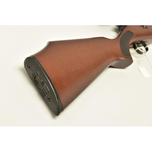 351 - A  .22 '' ROTARY MAGAZINE PUMP UP AIR RIFLE  fitted with a beech stock, in working order and excelle... 