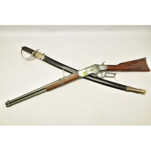 353 - AN INDIAN MADE SWORD WITH SCABBARD TOGETHER WITH A WHITE METAL COPY OF A WINCHESTER MODEL 1866 (2)