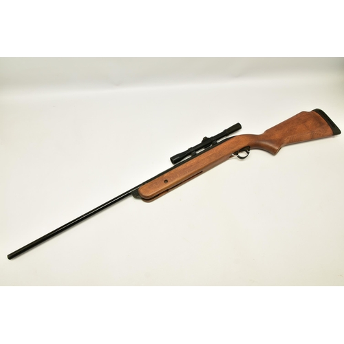 354 - A .22''   B.S.A. MERCURY AIR RIFLE fitted with a Bisley scope, serial number ZB1112, its front and r... 