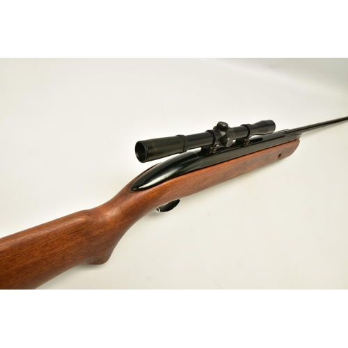 354 - A .22''   B.S.A. MERCURY AIR RIFLE fitted with a Bisley scope, serial number ZB1112, its front and r... 