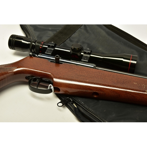 366 - A FALCON 22'' CO2 AIR RIFLE, serial number 93700, fitted with a Simmons scope, other than a minor ab... 