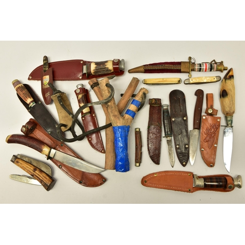 367 - FOUR SHEATH KNIVES WITH SHEATHS, the first by Rostrei Soligen, two by J Howell & Sons, Sheffield, an... 