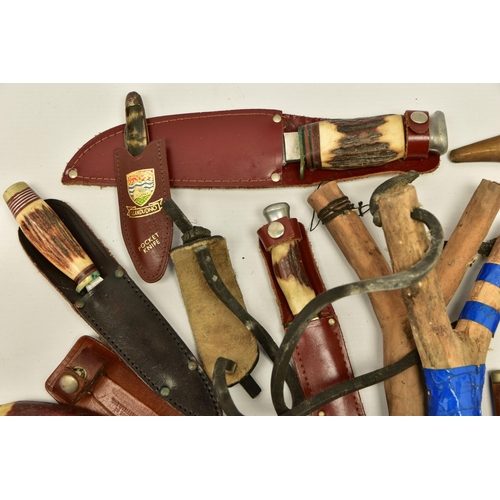 367 - FOUR SHEATH KNIVES WITH SHEATHS, the first by Rostrei Soligen, two by J Howell & Sons, Sheffield, an... 