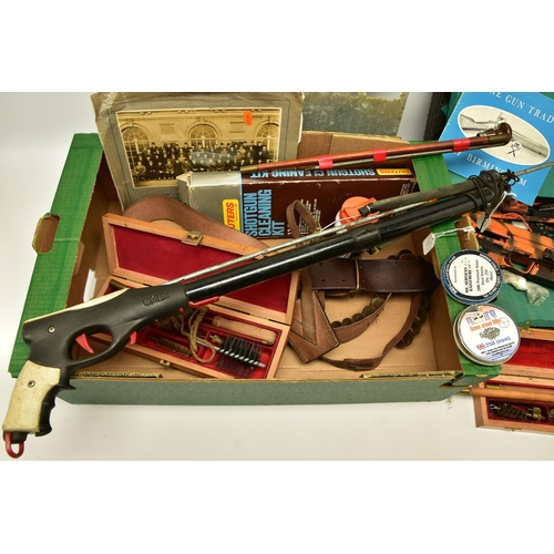 375 - AN UNDERWATER SPEAR GUN WITH SHAFT, three good quality 12 bore shotgun cleaning kits, a leather belt... 