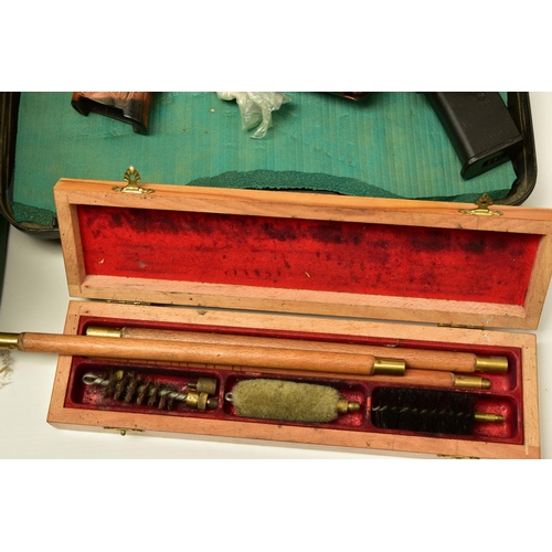 375 - AN UNDERWATER SPEAR GUN WITH SHAFT, three good quality 12 bore shotgun cleaning kits, a leather belt... 