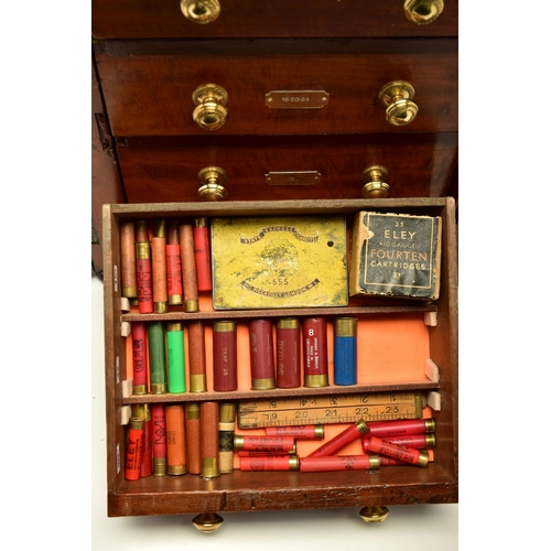 379 - COLLECTORS CARTRIDGES, (Purchaser must be the holder of a Shotgun Certificate), a four drawer table ... 