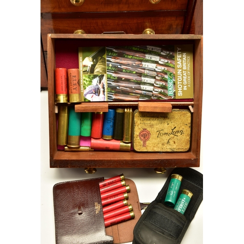 379 - COLLECTORS CARTRIDGES, (Purchaser must be the holder of a Shotgun Certificate), a four drawer table ... 