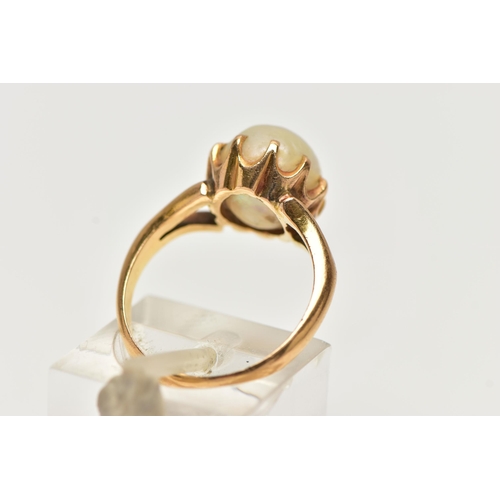 6 - AN EARLY 20TH CENTURY PEARL RING, the pearl measuring approximately 10.2mm by 8.9mm (depth 8.8mm), p... 