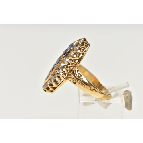 7 - A LATE VICTORIAN 18CT YELLOW GOLD SAPPHIRE AND DIAMOND RING OF MARQUISE SHAPE OUTLINE, set with five... 