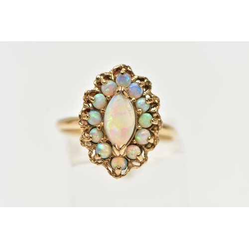 8 - A 9CT GOLD OPAL CLUSTER RING, set with a principal marquise shape opal cabochon surrounded by circul... 