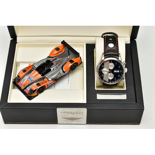 9 - A RAIDILLON 'CONQUEST ENDURANCE' DAY DATE WRISTWATCH WITH PRESENTATION BOX, the watch with black dia... 