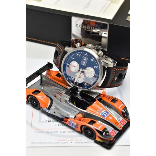 9 - A RAIDILLON 'CONQUEST ENDURANCE' DAY DATE WRISTWATCH WITH PRESENTATION BOX, the watch with black dia... 