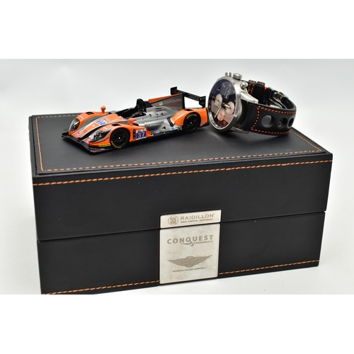 9 - A RAIDILLON 'CONQUEST ENDURANCE' DAY DATE WRISTWATCH WITH PRESENTATION BOX, the watch with black dia... 