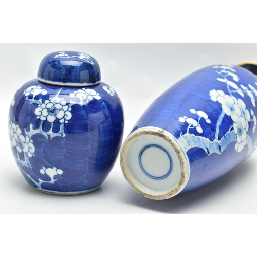 166 - AN EARLY 20TH CENTURY CHINESE BLUE AND WHITE PRUNUS BLOSSOM GINGER JAR AND COVER AND A SIMILARLY DEC... 