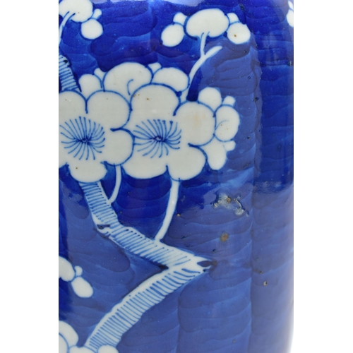 166 - AN EARLY 20TH CENTURY CHINESE BLUE AND WHITE PRUNUS BLOSSOM GINGER JAR AND COVER AND A SIMILARLY DEC... 