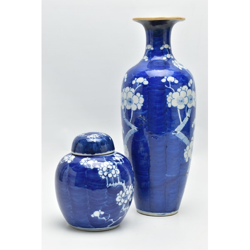 166 - AN EARLY 20TH CENTURY CHINESE BLUE AND WHITE PRUNUS BLOSSOM GINGER JAR AND COVER AND A SIMILARLY DEC... 