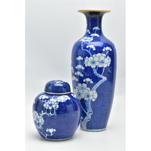 166 - AN EARLY 20TH CENTURY CHINESE BLUE AND WHITE PRUNUS BLOSSOM GINGER JAR AND COVER AND A SIMILARLY DEC... 