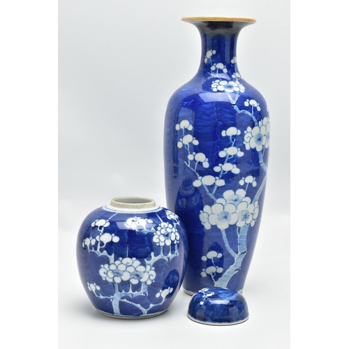 166 - AN EARLY 20TH CENTURY CHINESE BLUE AND WHITE PRUNUS BLOSSOM GINGER JAR AND COVER AND A SIMILARLY DEC... 