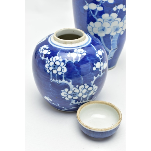 166 - AN EARLY 20TH CENTURY CHINESE BLUE AND WHITE PRUNUS BLOSSOM GINGER JAR AND COVER AND A SIMILARLY DEC... 