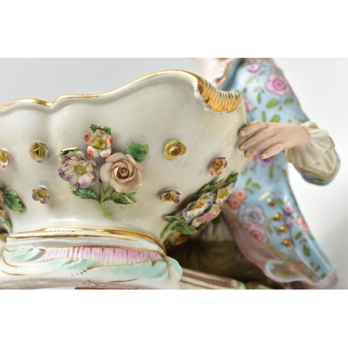 167 - A 19TH CENTURY MEISSEN FIGURAL SWEETMEAT DISH, NUMBER 2863 AFTER A DESIGN BY  J.J. KANDLER, modelled... 