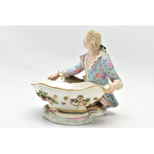 167 - A 19TH CENTURY MEISSEN FIGURAL SWEETMEAT DISH, NUMBER 2863 AFTER A DESIGN BY  J.J. KANDLER, modelled... 