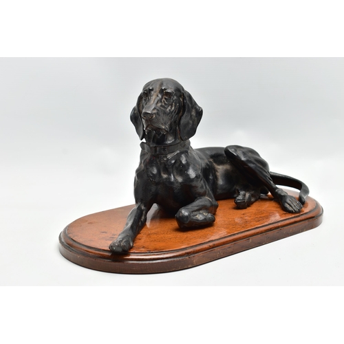 175 - AFTER NIKOLAI IVANOVICH LIBERICH (1828-1883) a cast iron figure of a recumbent bloodhound, bearing s... 