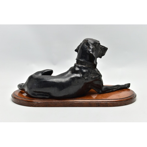 175 - AFTER NIKOLAI IVANOVICH LIBERICH (1828-1883) a cast iron figure of a recumbent bloodhound, bearing s... 