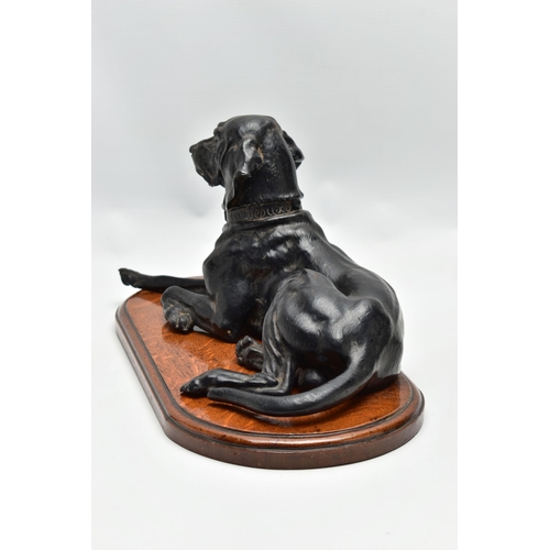 175 - AFTER NIKOLAI IVANOVICH LIBERICH (1828-1883) a cast iron figure of a recumbent bloodhound, bearing s... 