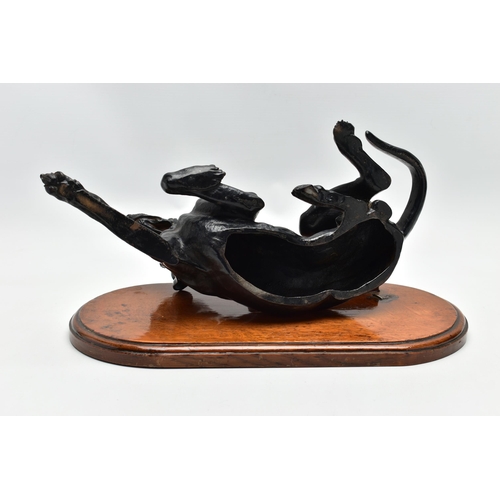 175 - AFTER NIKOLAI IVANOVICH LIBERICH (1828-1883) a cast iron figure of a recumbent bloodhound, bearing s... 