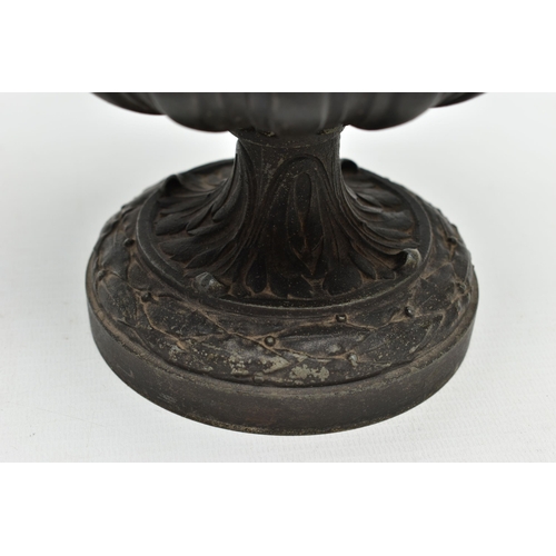 181 - A PAIR OF 19TH CENTURY BLACK PAINTED SPELTER TWIN HANDLED URNS AND COVERS, the covers cast with a pu... 