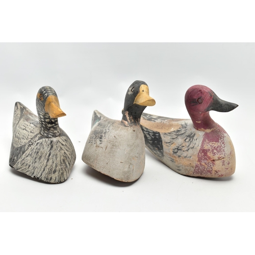 182 - THREE CARVED WOODEN DECOY DUCKS WITH POLYCHROME PAINTED DECORATION, impressed circle eyes, slightly ... 