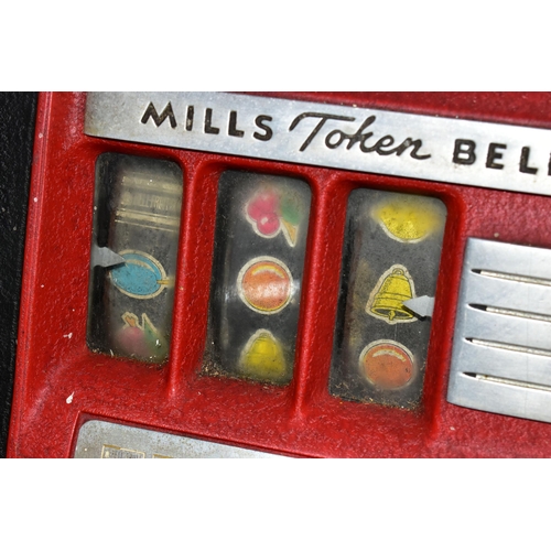 186 - A MILLS 'TOKEN BELL' ONE ARMED BANDIT,  red, black, chrome, aluminium and wood case, on a wooden bas... 