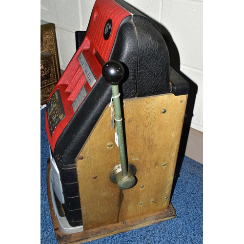 186 - A MILLS 'TOKEN BELL' ONE ARMED BANDIT,  red, black, chrome, aluminium and wood case, on a wooden bas... 