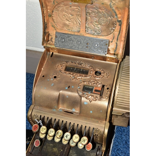 187 - A 20TH CENTURY AMERICAN BRASS CASH REGISTER BY NATIONAL DAYTON OF OHIO, mounted on a wooden plinth, ... 