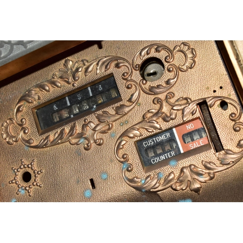 187 - A 20TH CENTURY AMERICAN BRASS CASH REGISTER BY NATIONAL DAYTON OF OHIO, mounted on a wooden plinth, ... 