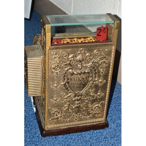 187 - A 20TH CENTURY AMERICAN BRASS CASH REGISTER BY NATIONAL DAYTON OF OHIO, mounted on a wooden plinth, ... 