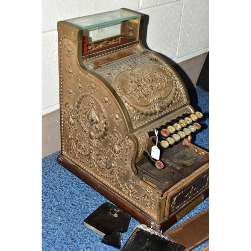 187 - A 20TH CENTURY AMERICAN BRASS CASH REGISTER BY NATIONAL DAYTON OF OHIO, mounted on a wooden plinth, ... 