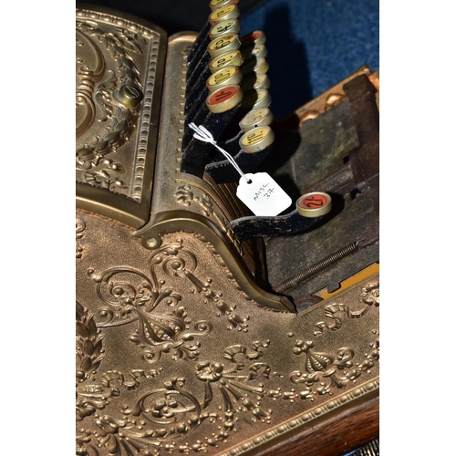 187 - A 20TH CENTURY AMERICAN BRASS CASH REGISTER BY NATIONAL DAYTON OF OHIO, mounted on a wooden plinth, ... 