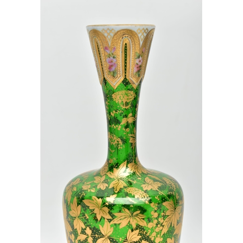 189 - A LATE 19TH CENTURY BOHEMIAN WHITE OVERLAID GREEN GLASS BALUSTER VASE, the white panels painted with... 