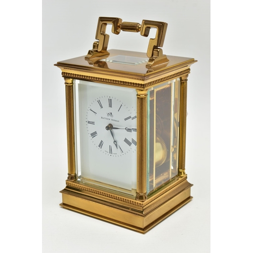 198 - A MATTHEW NORMAN OF LONDON BRASS CASED CARRIAGE CLOCK, Swiss movement, white enamel dial with Roman ... 