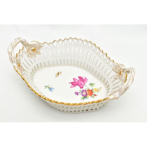 202 - A 20TH CENTURY KPM BERLIN RETICULATED TWIN HANDLED BASKET OF SHAPED OVAL FORM, painted with flowers ... 