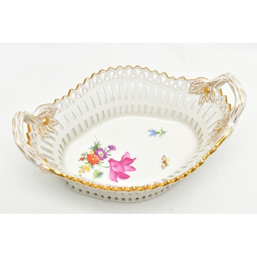 202 - A 20TH CENTURY KPM BERLIN RETICULATED TWIN HANDLED BASKET OF SHAPED OVAL FORM, painted with flowers ... 