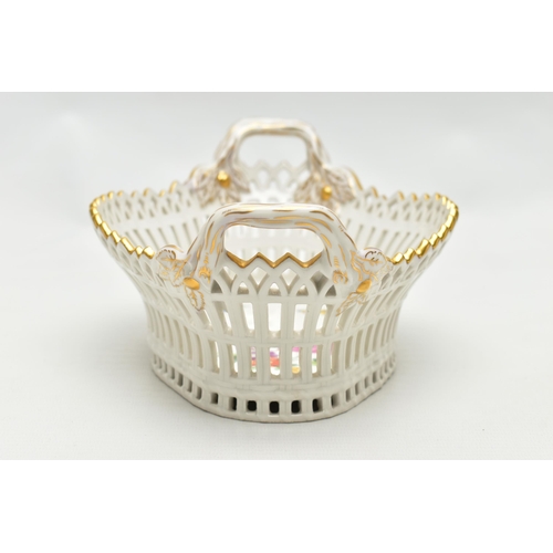 202 - A 20TH CENTURY KPM BERLIN RETICULATED TWIN HANDLED BASKET OF SHAPED OVAL FORM, painted with flowers ... 