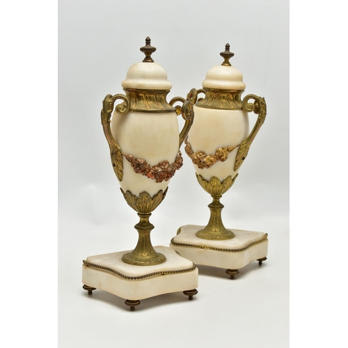 206 - A LATE 19TH CENTURY FRENCH WHITE MARBLE AND GILT METAL CLOCK GARNITURE, the clock with urn surmount ... 