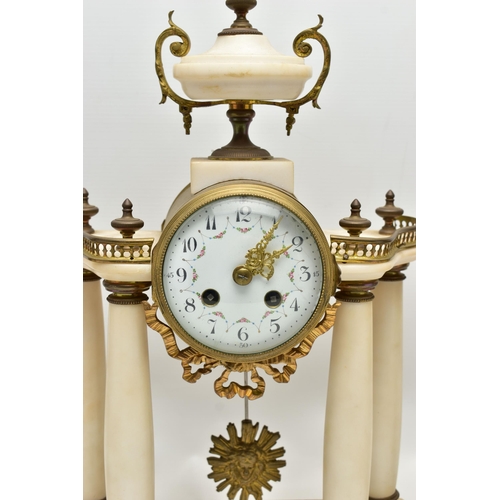 206 - A LATE 19TH CENTURY FRENCH WHITE MARBLE AND GILT METAL CLOCK GARNITURE, the clock with urn surmount ... 