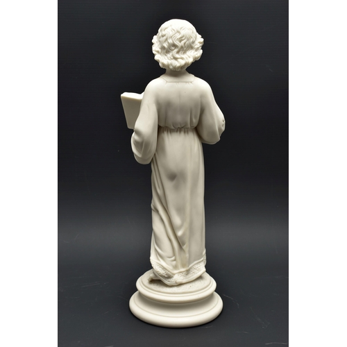 132 - A 19TH CENTURY PARIAN FIGURE OF THE CHRIST CHILD, modelled wearing robes, holding an open book inscr... 