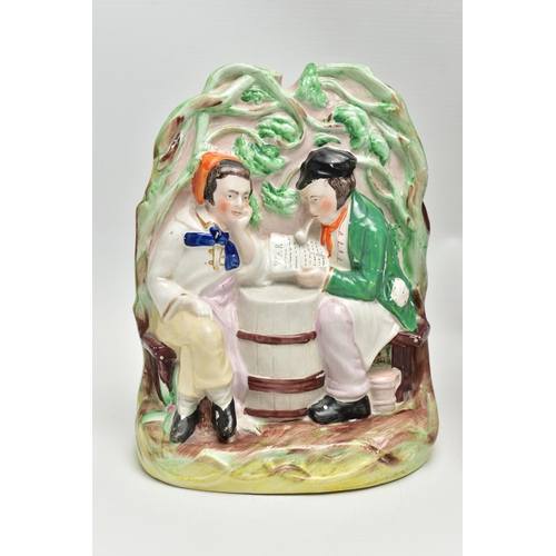 215 - A VICTORIAN STAFFORDSHIRE POTTERY TOBY JUG AND FOUR VICTORIAN STAFFORDSHIRE FIGURES, comprising a ju... 