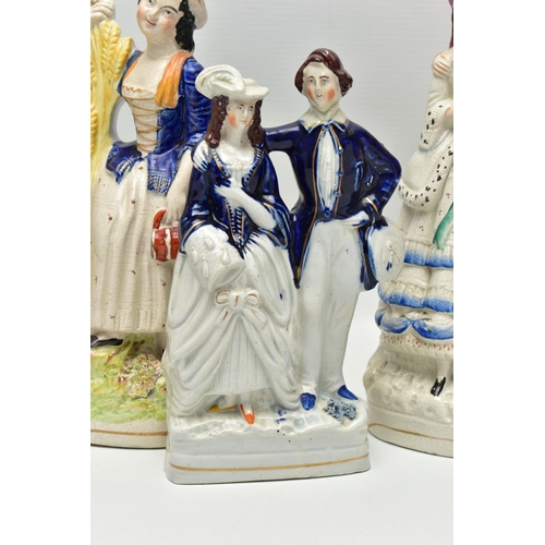 216 - FIVE VICTORIAN STAFFORDSHIRE POTTERY FIGURE GROUPS OF COUPLES, comprising a harvest scene, height 30... 